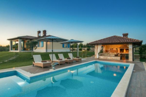 Villa Evelyn in Fažana with 50 m2 pool, jacuzzi, kids playground & sea view only 800 meters from beach
